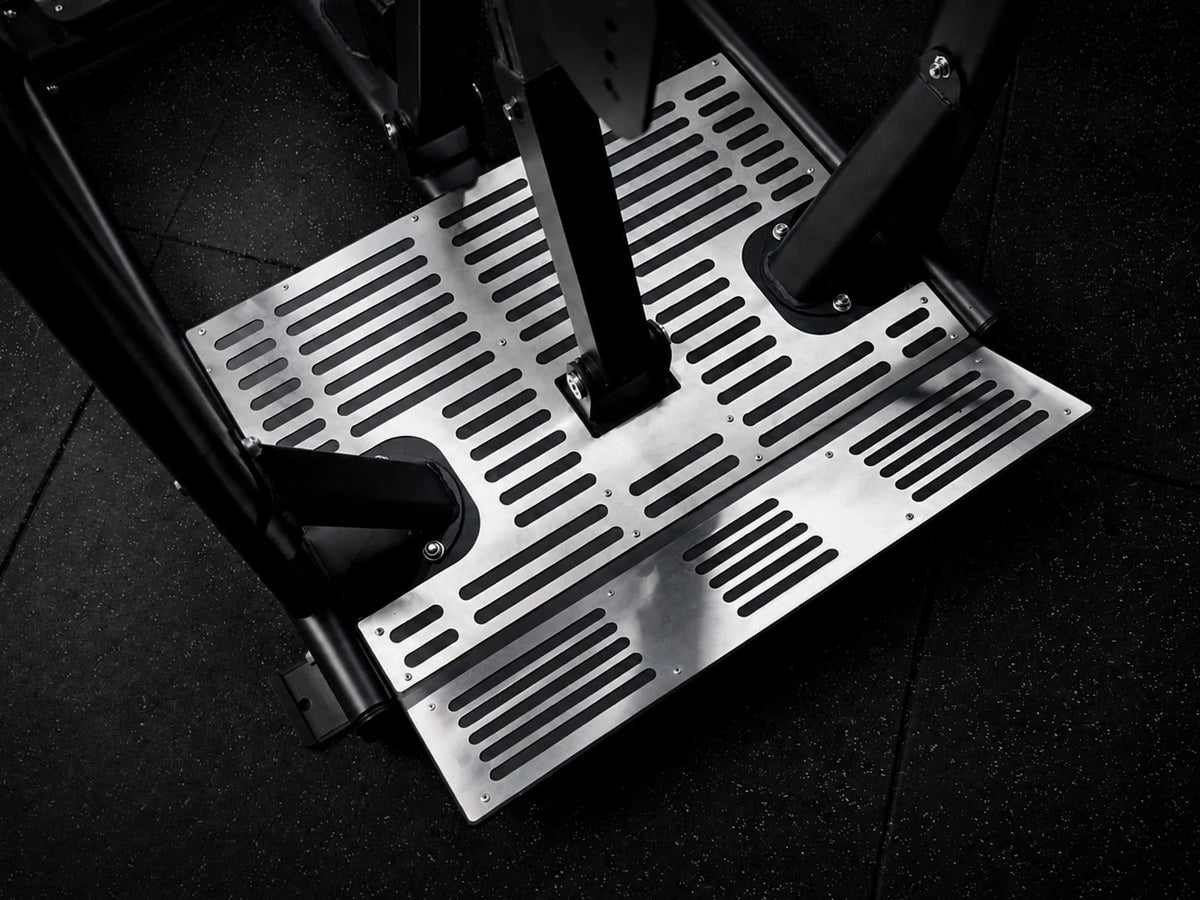 Reload Dual Chest Pull / Row Machine in use - chest supported rowing position with Olympic plates loaded