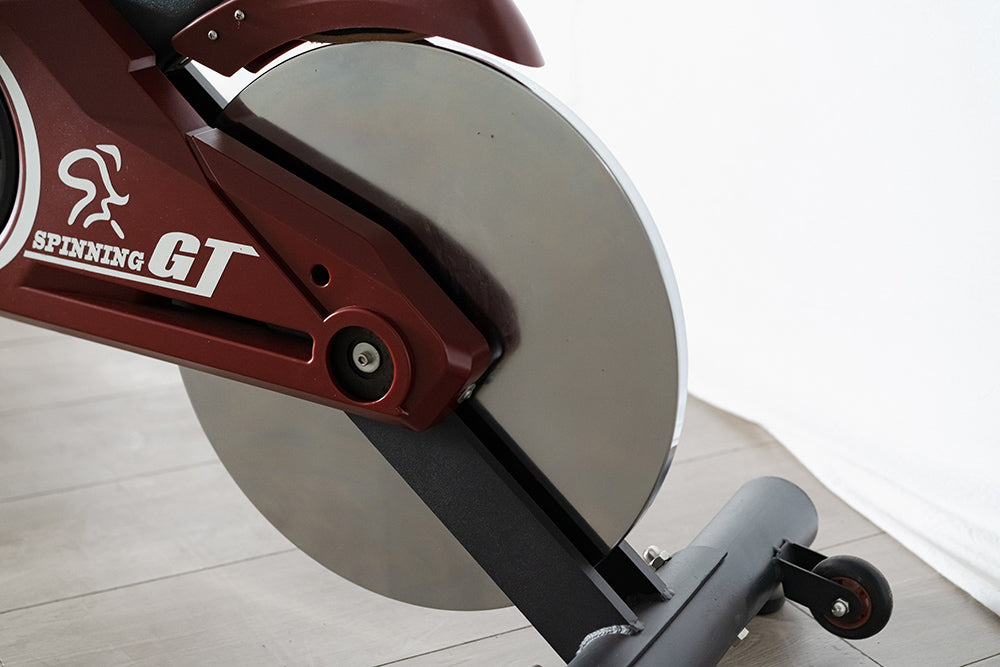 Heavy-duty 18 kg flywheel spin bike by Reload