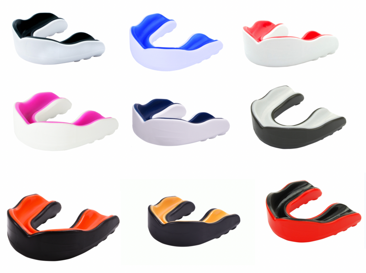 Dual-layer shock absorbing mouthguard for combat sports