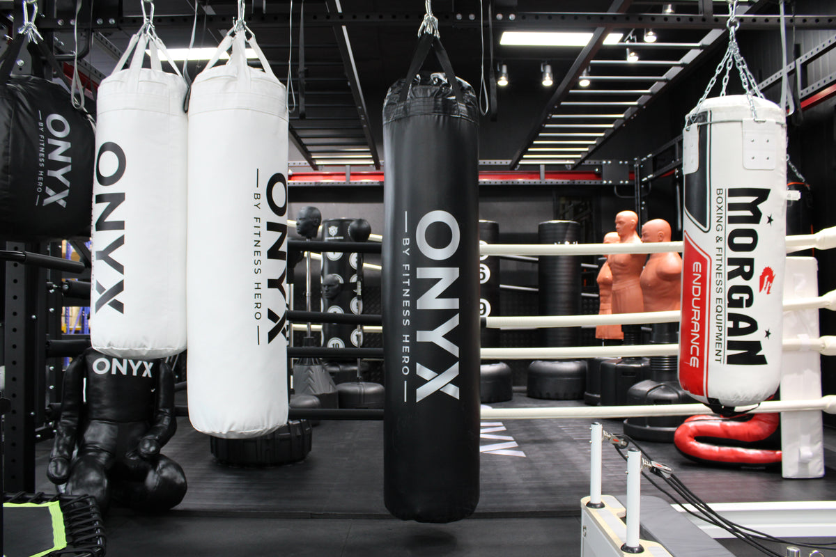 Onyx Premium Boxing Bag in black - hanging by reinforced nylon straps