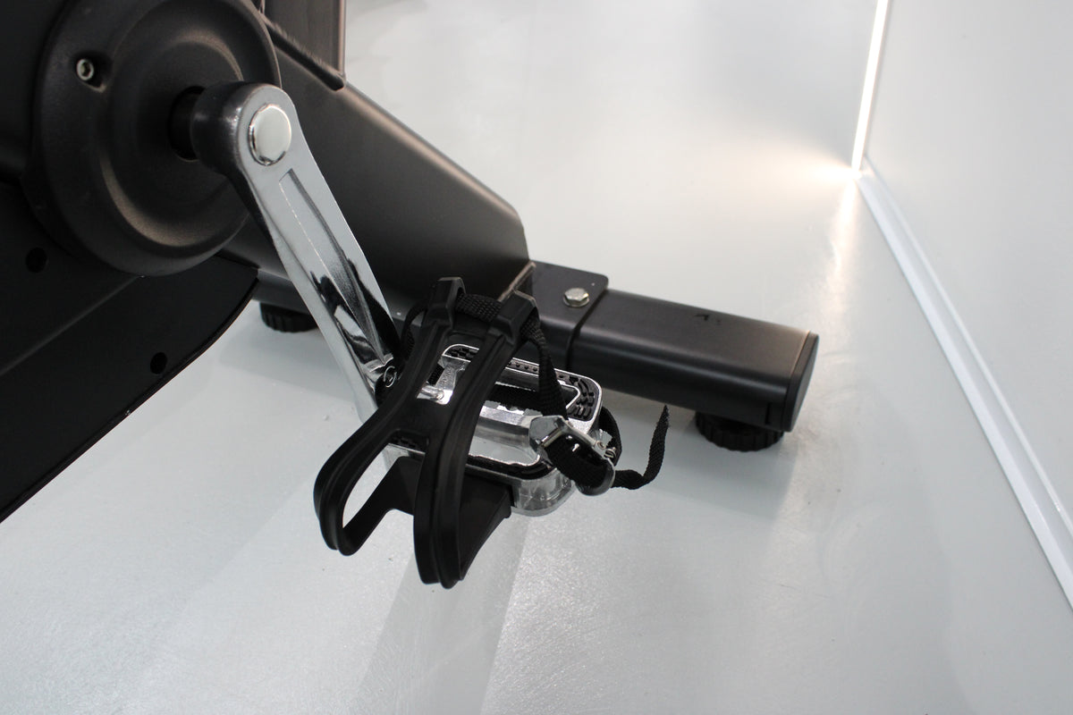 Close-up of a mechanical bike pedals