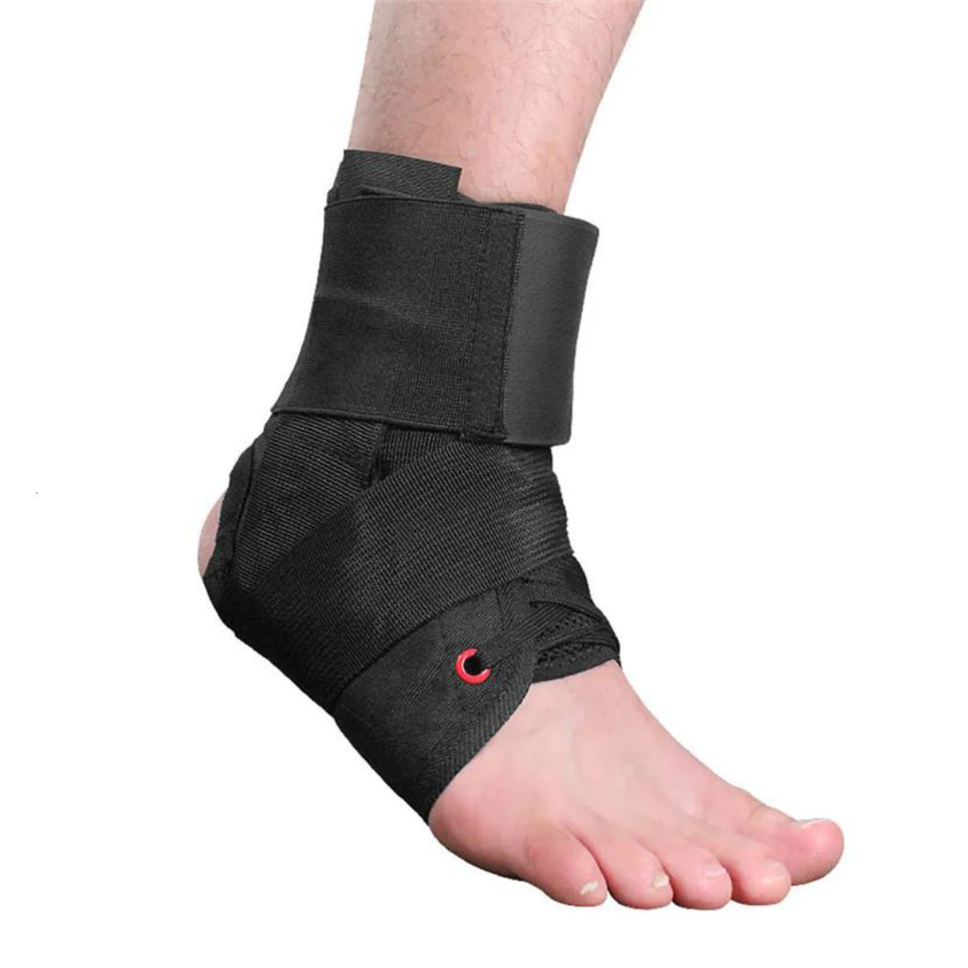 Black ankle support brace on a foot against a white background