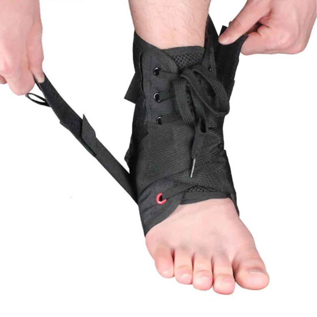 Black ankle support brace being worn on a foot with hands adjusting it.