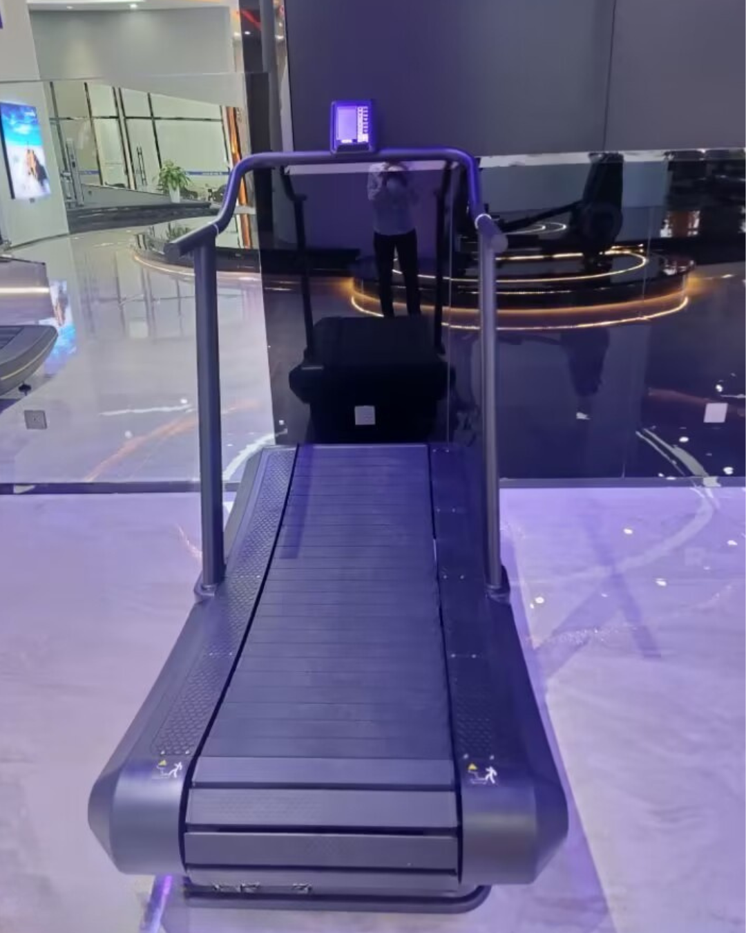 Curved Treadmill on display in a showroom