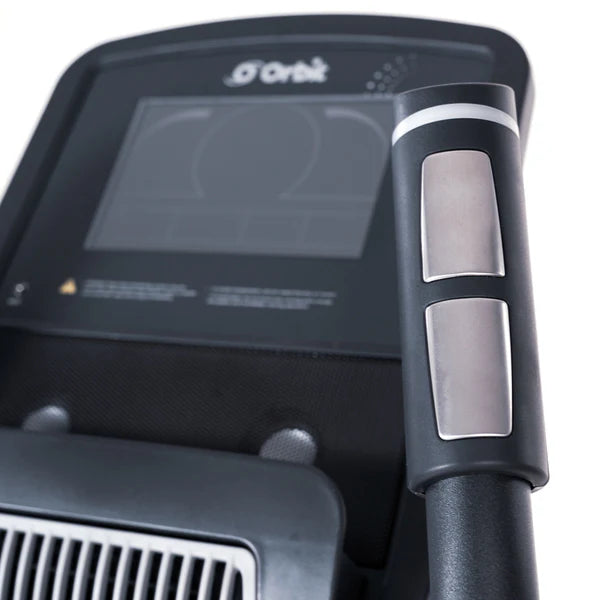 Close-up of a console with a screen and control buttons on a white background