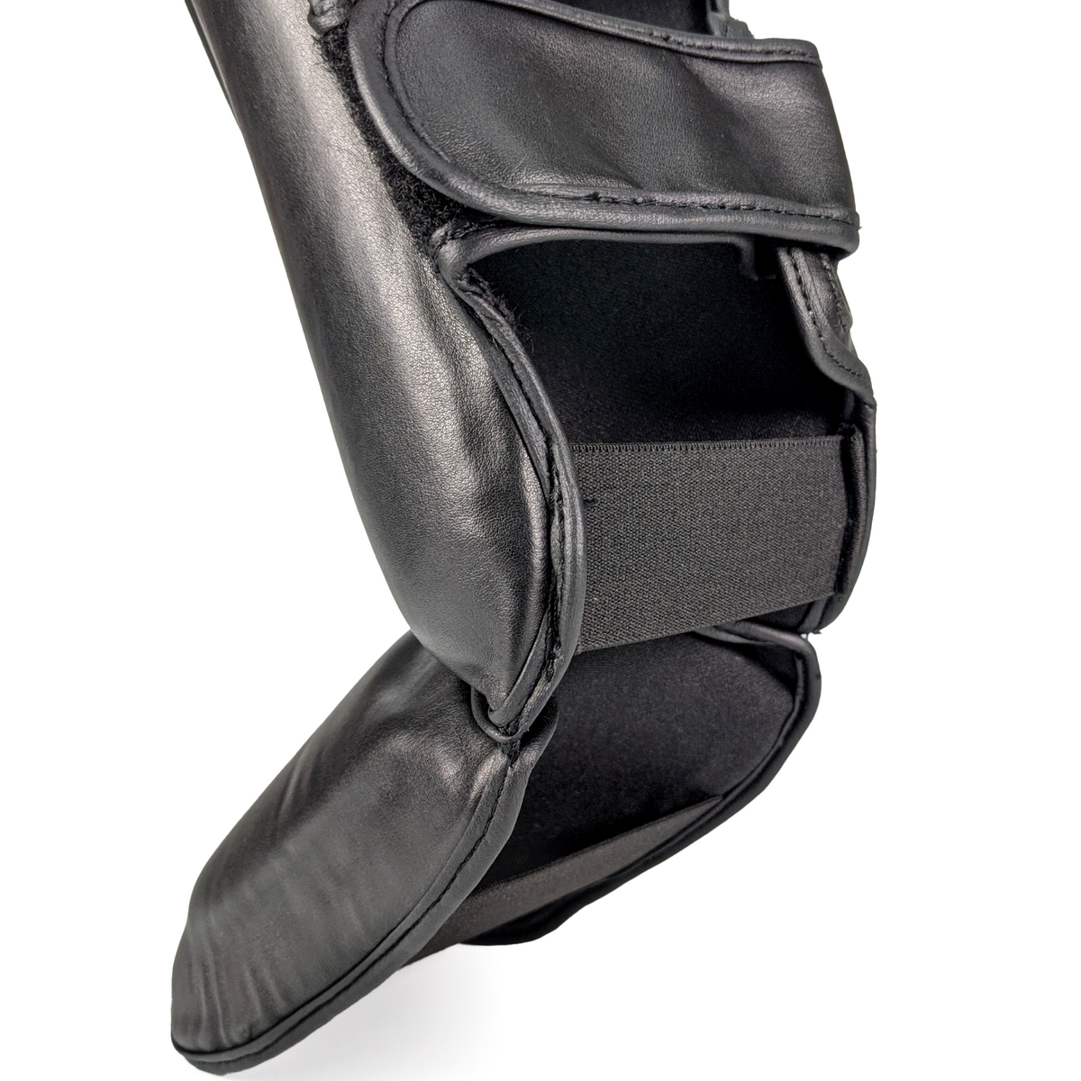 Zett Pro kickboxing shin insteps in black, view 3