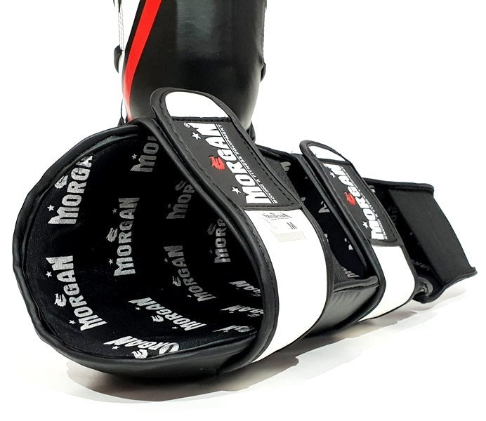 Fitness Hero presents The Morgan Classic V2 shin and instep guards. These guards are super durable and offer coaches, trainers, and athletes high-quality performance. Using a latex high-density latex inner padding has resulted in an extra thick contoured moulded foam technology that ultimately provides high shock-absorbing shin and instep coverage for all training demands.