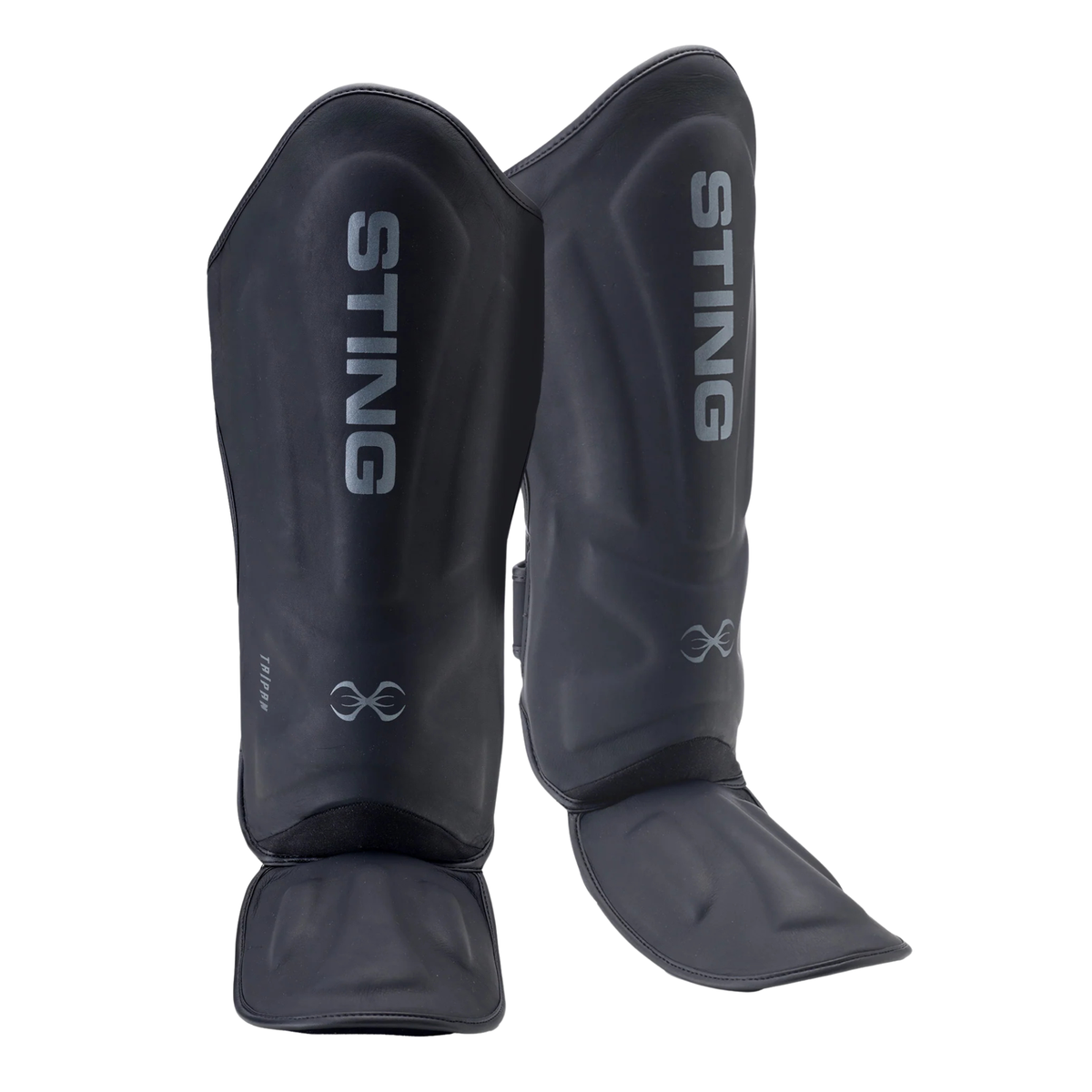 Black shin and foot protectors with adjustable straps and reinforced padding.