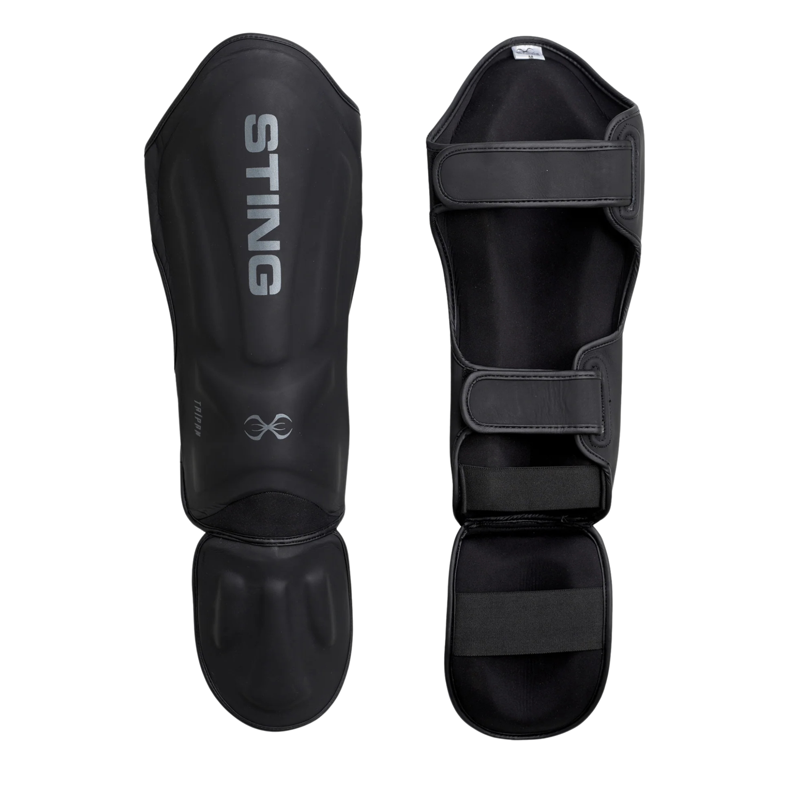 Black shin and foot protectors with adjustable straps and reinforced padding.