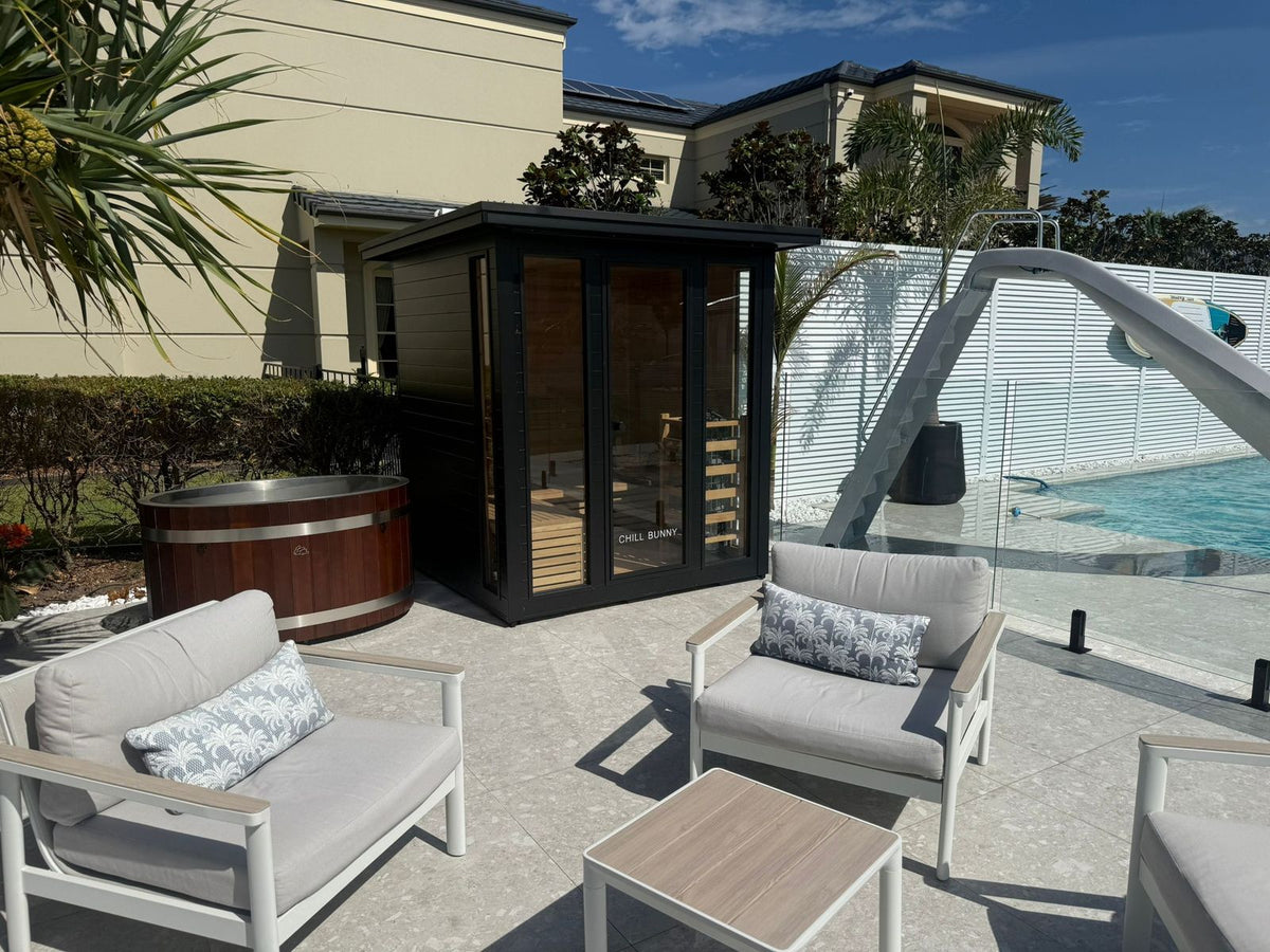 Outdoor traditional sauna beside pool installation detail