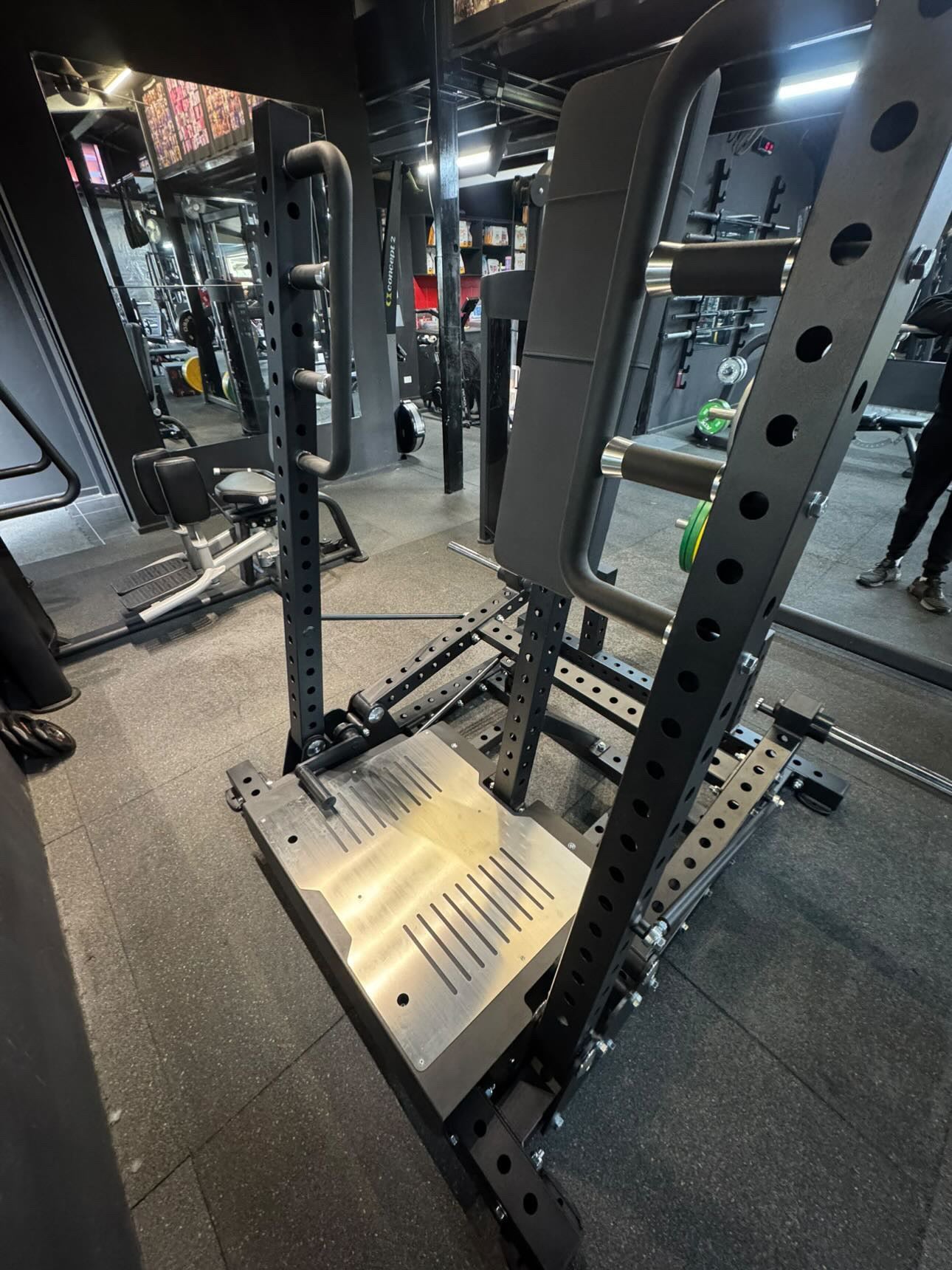 Reload plate loaded standing chest press machine (Coffin Press) in white background