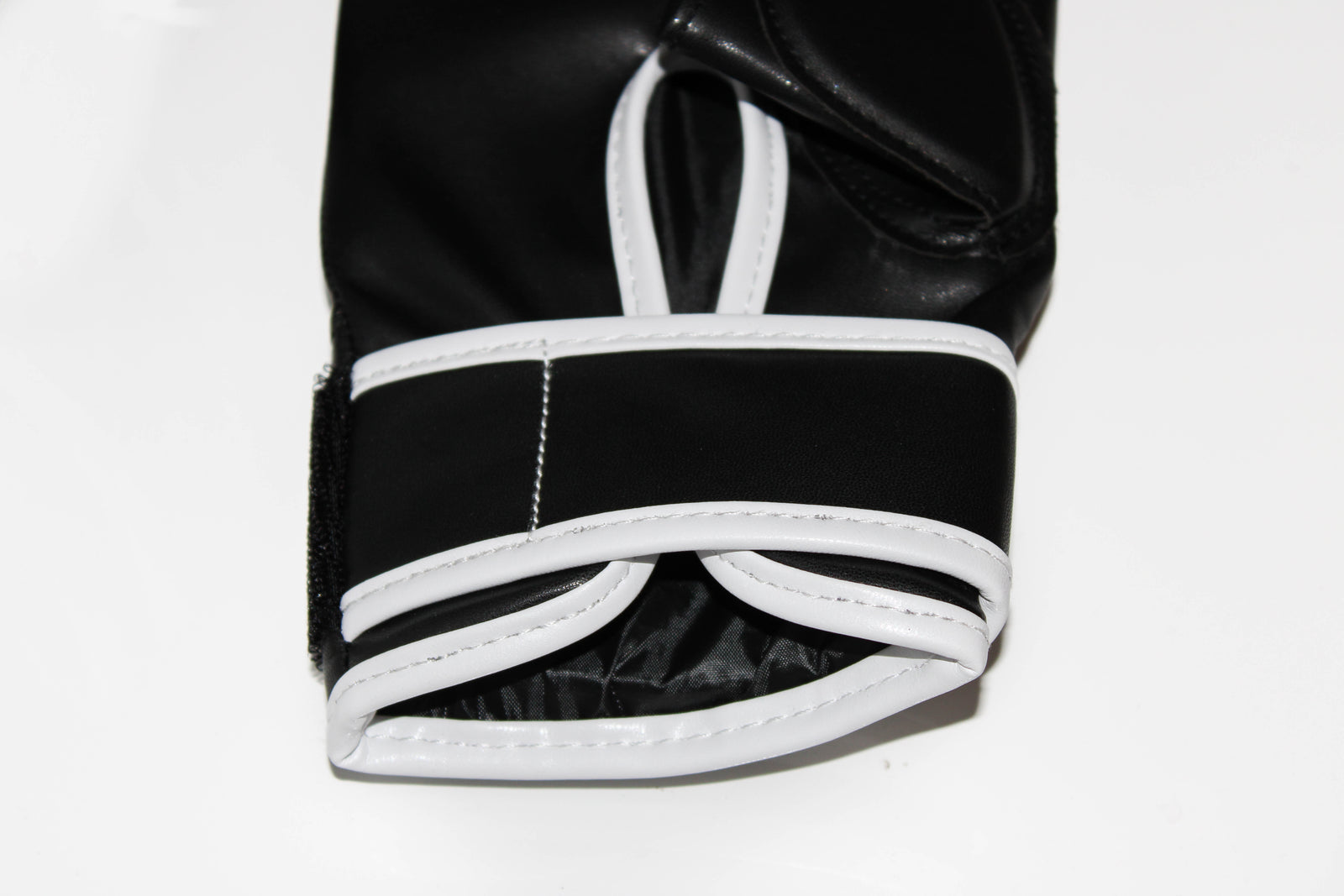 Onyx Elite open thumb boxing mitts in black and white