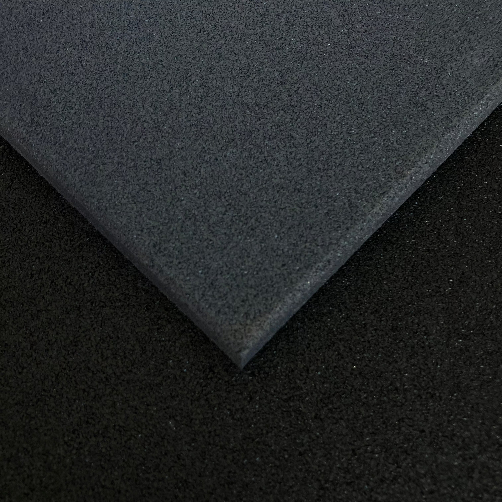 Solid 1m x 1m tiles in a range of colours including red, grey and green