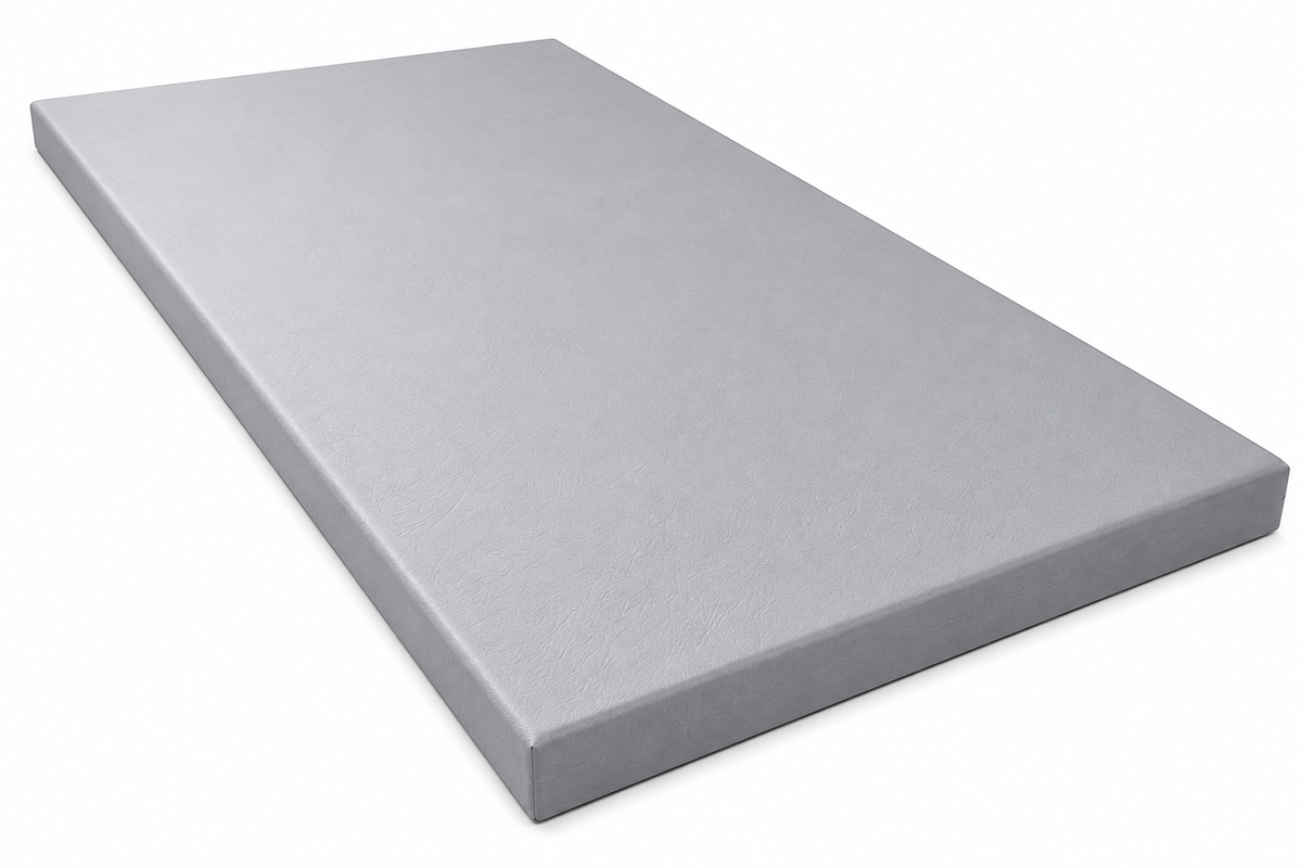 A rectangular gray foam mattress topper or cushion with a textured surface, shown at an angle on a plain white background.