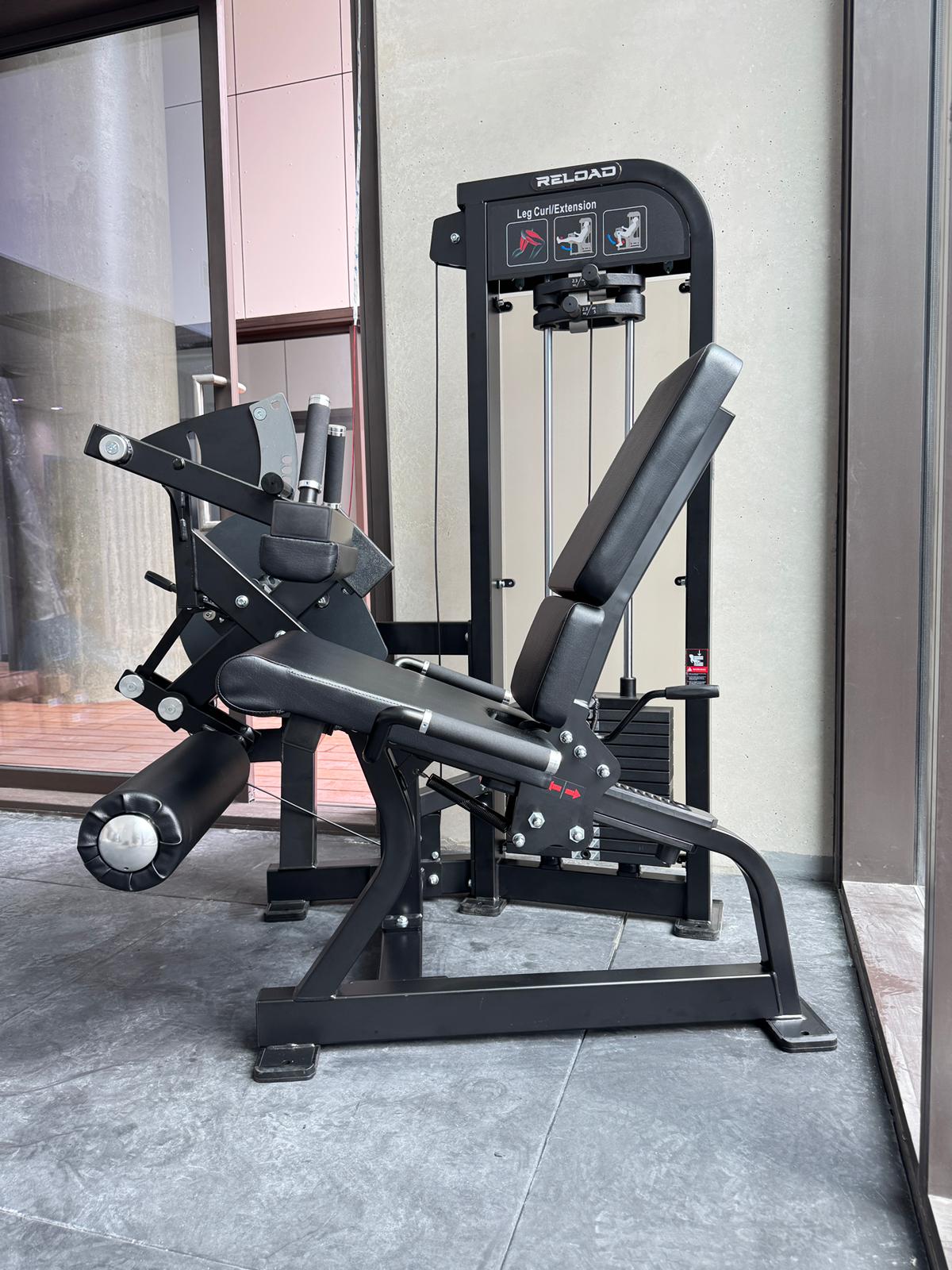 Dual Leg Curl / Extension HS- Series setup in commercial gym. Reload by Fitness Hero - Premium Gym Equipment