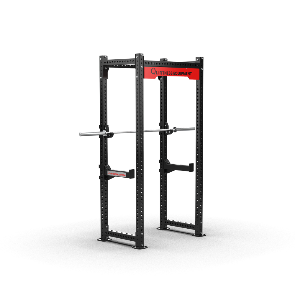 QLI Power Rack QPR158 four-post rack with red branded crossmember, racked barbell, J-hooks and spotter arms