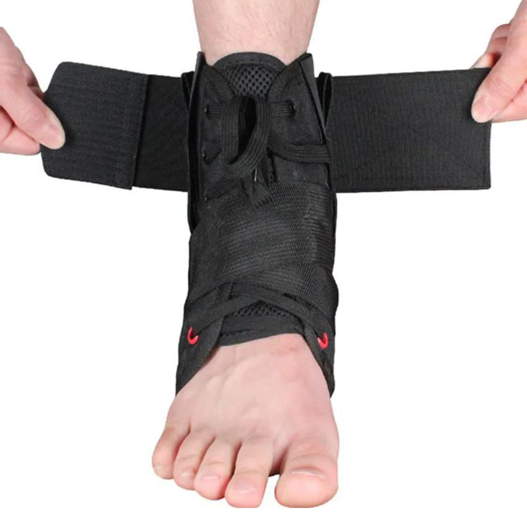 Black ankle support brace being worn on a foot with a white background
