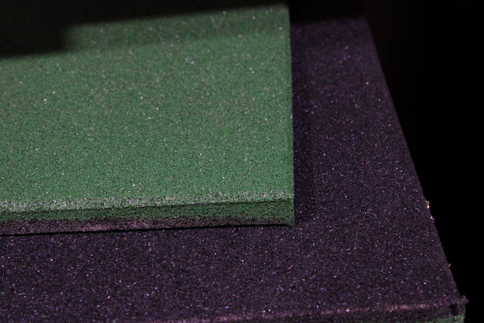 Close-up of a green rubber mat with a textured surface