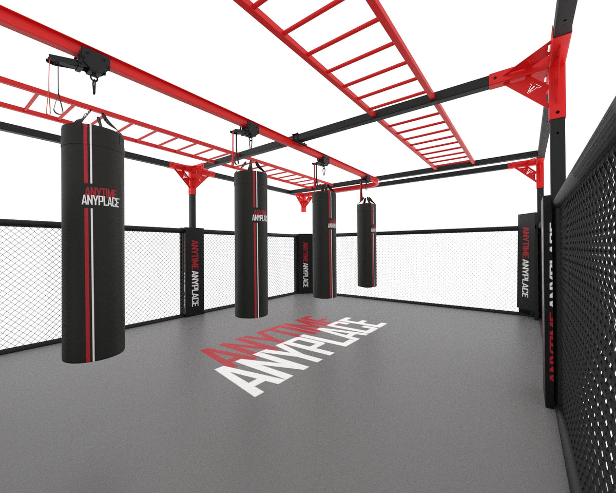 Inside view of MMA cage showing monkey bars and multiple heavy bags suspended from pulleys

