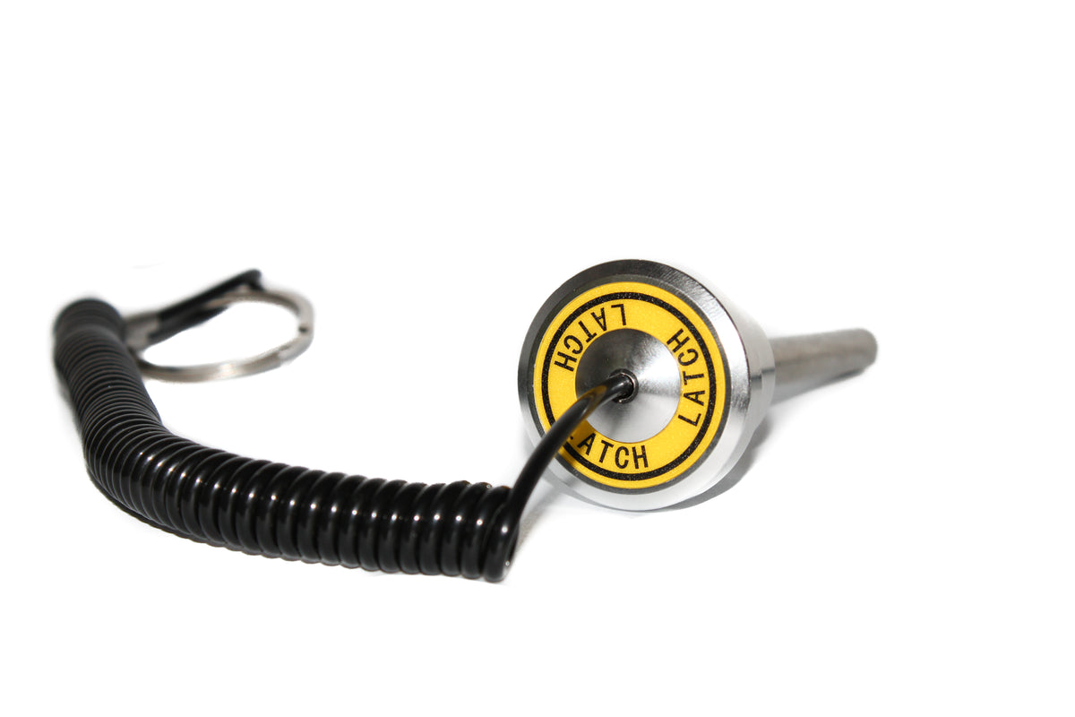 Magnetic weight stack selector pin knob face with LATCH label and coiled lanyard tether
