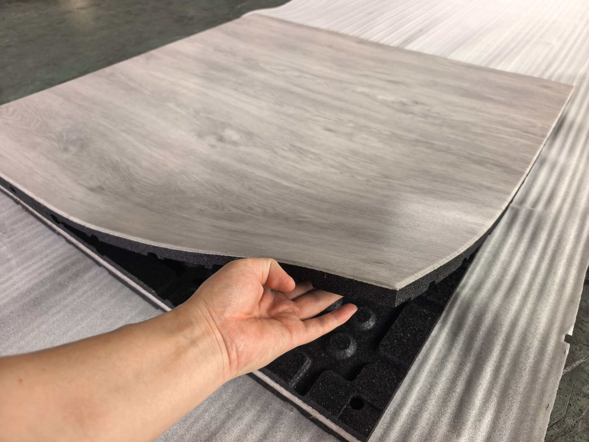 Slate look pale grey PVC laminated gym flooring tile 15mm close up