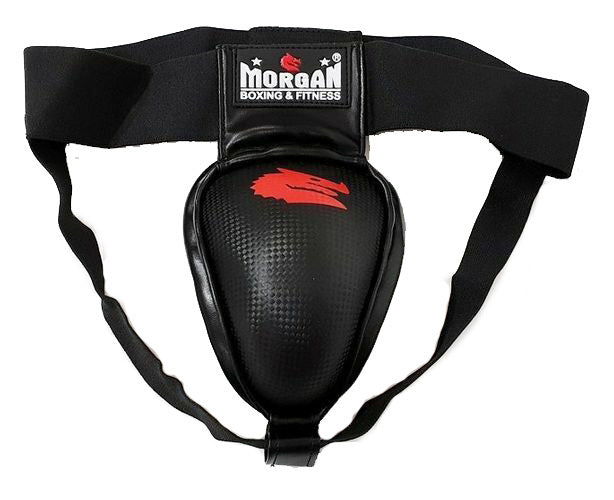 the Morgan Elite steel groin guard. This guard is made using a steel cup fortification for unbeatable defence against the most savage opponents. This ergonomically designed groin guard features an hook and loop Velcro closure, an elasticated waist strap to fit around most body shapes, a shatterproof metal cup. AVAILABLE IN 3 SIZES